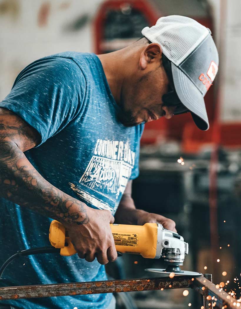Man Using Angle Grinder